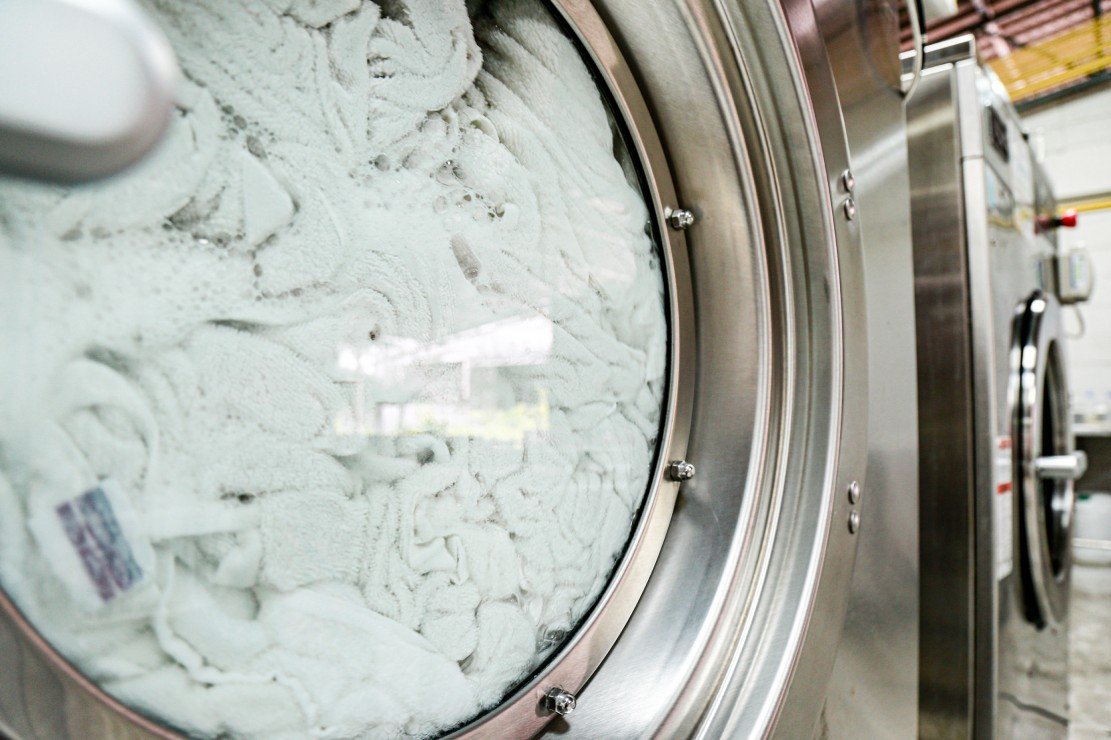 Fabric softener wash in industrial washing machine